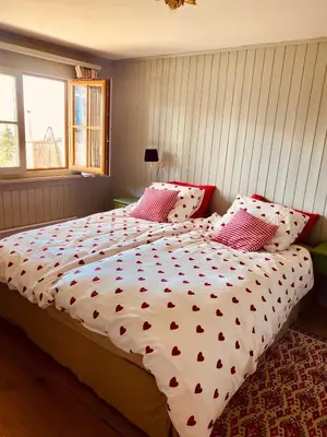 Ein Bett oder Betten in einem Zimmer der Unterkunft Chalet Belland