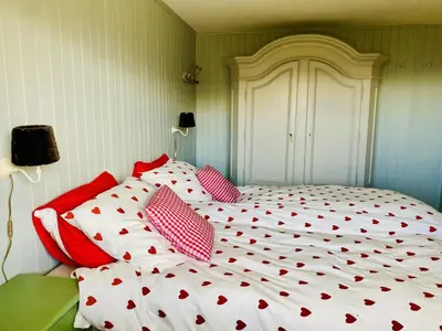 Ein Bett oder Betten in einem Zimmer der Unterkunft Chalet Belland