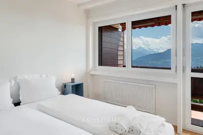 Ein Bett oder Betten in einem Zimmer der Unterkunft Le San Giorgio - Moubra - Parking By CosyHome