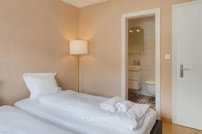Ein Bett oder Betten in einem Zimmer der Unterkunft Le San Giorgio - Moubra - Parking By CosyHome