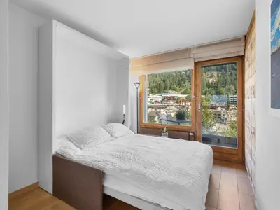 Ein Bett oder Betten in einem Zimmer der Unterkunft Apartment Victoria A 20 by Interhome
