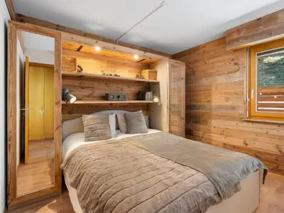 Ein Bett oder Betten in einem Zimmer der Unterkunft Apartment Rochemont B26 by Interhome