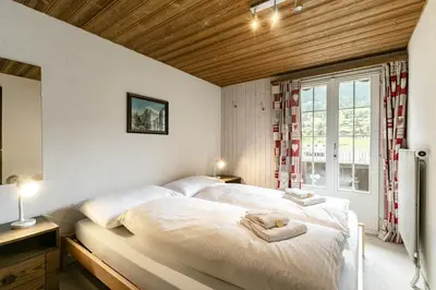 Ein Bett oder Betten in einem Zimmer der Unterkunft Apartment Rotstock - GRIWA RENT AG