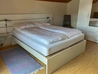 Ein Bett oder Betten in einem Zimmer der Unterkunft Domizil Seeidyll