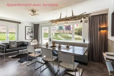 Ein Sitzbereich in der Unterkunft Appartement 2 chambres et terrasse