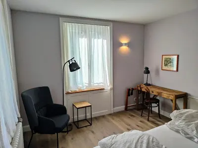 Ein Bett oder Betten in einem Zimmer der Unterkunft B&B Wild und Wandel Meiringen