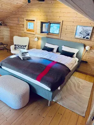 Ein Bett oder Betten in einem Zimmer der Unterkunft Hüttli Chalet Weitblick 10 Minuten zur Skigondel und Aletschgletscher