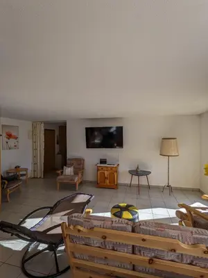 TV/Unterhaltungsangebot in der Unterkunft Apartment Above the Rooftops - Mountain Panorama