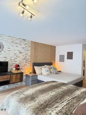 Ein Bett oder Betten in einem Zimmer der Unterkunft Holiday Leukerbad Mountain Nature Free Parking Free WiFi