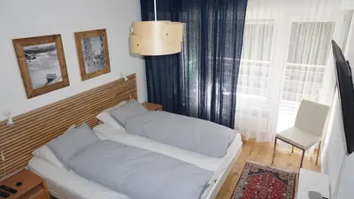 Ein Bett oder Betten in einem Zimmer der Unterkunft Alpine Nest Crans-Montana