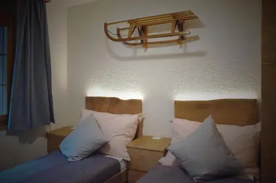 Ein Bett oder Betten in einem Zimmer der Unterkunft VIDOLICA mountain apartment