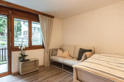 Ein Bett oder Betten in einem Zimmer der Unterkunft Zermatt - well located and equipped studio