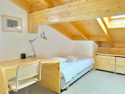 Ein Bett oder Betten in einem Zimmer der Unterkunft Crans-Montana 3BR - Mountain View, Balcony and Parking