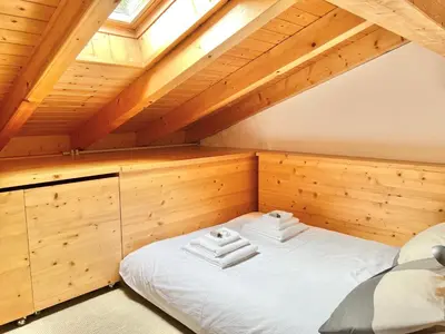 Ein Bett oder Betten in einem Zimmer der Unterkunft Crans-Montana 3BR - Mountain View, Balcony and Parking