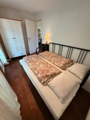 Ein Bett oder Betten in einem Zimmer der Unterkunft Alpine Haven Chalet II