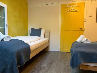 Ein Bett oder Betten in einem Zimmer der Unterkunft Wesley Panorama - Penthouse for Family & Friends