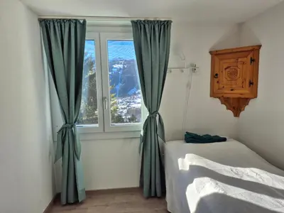 Ein Bett oder Betten in einem Zimmer der Unterkunft Bijou mit top Aussicht