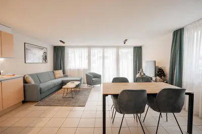 Ein Sitzbereich in der Unterkunft Turuwang Apartment by HomeFlow