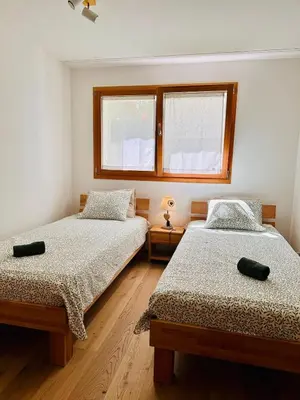 Ein Bett oder Betten in einem Zimmer der Unterkunft Peak Apartment - Saas-Fee