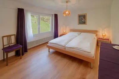 Ein Bett oder Betten in einem Zimmer der Unterkunft Haus Alpsegen