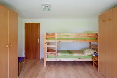 Ein Bett oder Betten in einem Zimmer der Unterkunft Haus Alpsegen