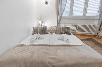 Ein Bett oder Betten in einem Zimmer der Unterkunft Crans-Montana - Studio centre 2 pers - Rue du Prado