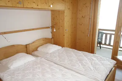 Ein Bett oder Betten in einem Zimmer der Unterkunft Plein Ciel VA 021 MOUNTAIN apartment 8 pers