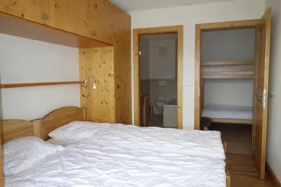 Ein Bett oder Betten in einem Zimmer der Unterkunft Plein Ciel VA 021 MOUNTAIN apartment 8 pers