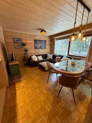 Ein Sitzbereich in der Unterkunft Charmant appartement - Crans-Montana