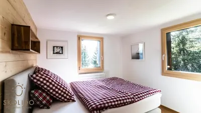 Ein Bett oder Betten in einem Zimmer der Unterkunft Soldanella Chalet, Riederalp Golmenegg