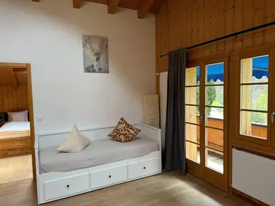 Ein Bett oder Betten in einem Zimmer der Unterkunft Villa Eiger Close to Grindelwald