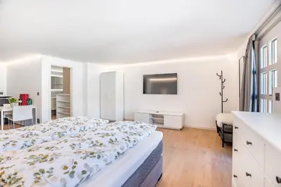 Ein Bett oder Betten in einem Zimmer der Unterkunft Completely renovated, furnished studio with plenty of comfort