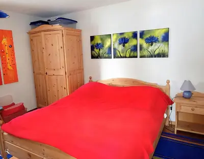 Ein Bett oder Betten in einem Zimmer der Unterkunft Minerva EG Süd