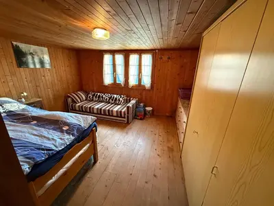 Ein Bett oder Betten in einem Zimmer der Unterkunft Wohnung in Gspon zu vermieten