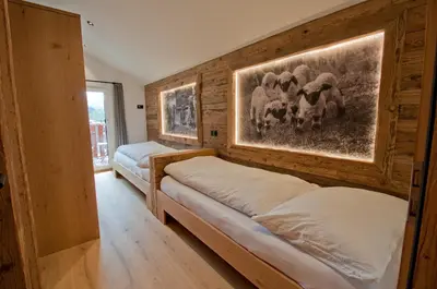 Ein Bett oder Betten in einem Zimmer der Unterkunft Aletschhorn, Chalet Wiedersehen