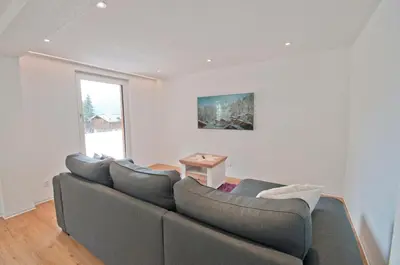 Ein Sitzbereich in der Unterkunft Bishorn, Chalet Wiedersehn