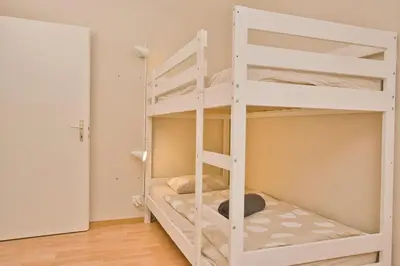 Ein Bett oder Betten in einem Zimmer der Unterkunft Apartment by Lake Brienz with lake view