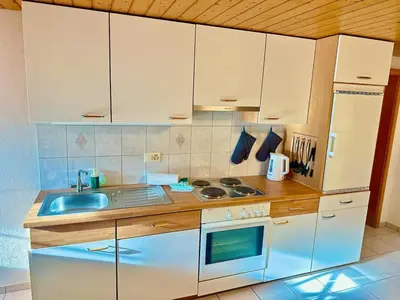 Küche/Küchenzeile in der Unterkunft Scenic Stay Grindelwald Interlaken & Lauterbrunen