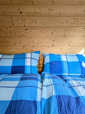 Ein Bett oder Betten in einem Zimmer der Unterkunft Ferienwohnung Rosenburg