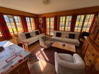 Ein Sitzbereich in der Unterkunft Appartement Églantier