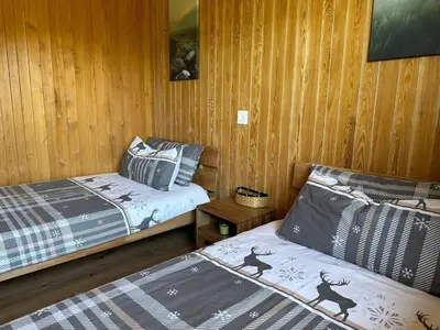 Ein Bett oder Betten in einem Zimmer der Unterkunft Chalet Zytrösli