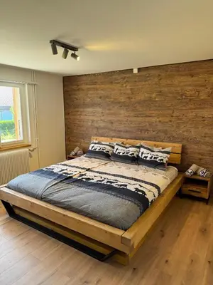 Ein Bett oder Betten in einem Zimmer der Unterkunft Chalet Zytrösli