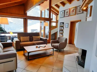 Ein Sitzbereich in der Unterkunft Apartment Chalet Abendrot apARTments-31 by Interhome