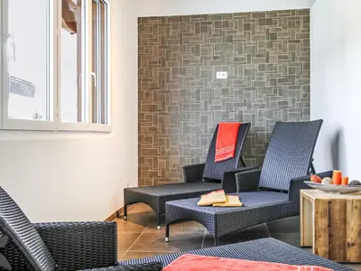 Ein Sitzbereich in der Unterkunft Apartment A11 by Interhome