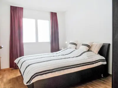 Ein Bett oder Betten in einem Zimmer der Unterkunft Apartment A11 by Interhome