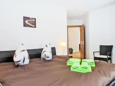 Ein Bett oder Betten in einem Zimmer der Unterkunft Apartment A11 by Interhome