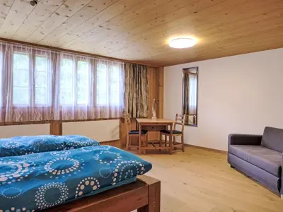 Ein Bett oder Betten in einem Zimmer der Unterkunft Apartment Eisiboden by Interhome