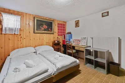Ein Bett oder Betten in einem Zimmer der Unterkunft Maison Crans-Montana, 7 pers - 7 lits, Jardin & Carnotzet