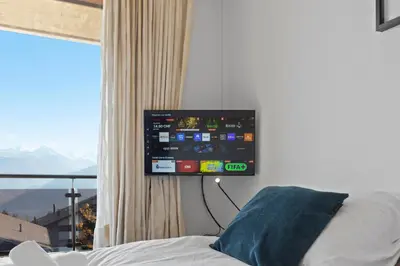 TV/Unterhaltungsangebot in der Unterkunft Crans-Montana, 5 pers, balcon vue et parking privé