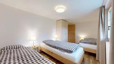 Ein Bett oder Betten in einem Zimmer der Unterkunft Chalet Wieseli